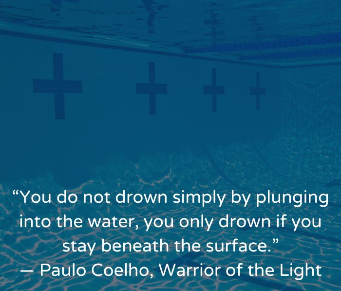 Underwater in the deep end of a pool. Quote: "You do not drown simply by plunging into the water, you only drown if you stay beneath the surface." 